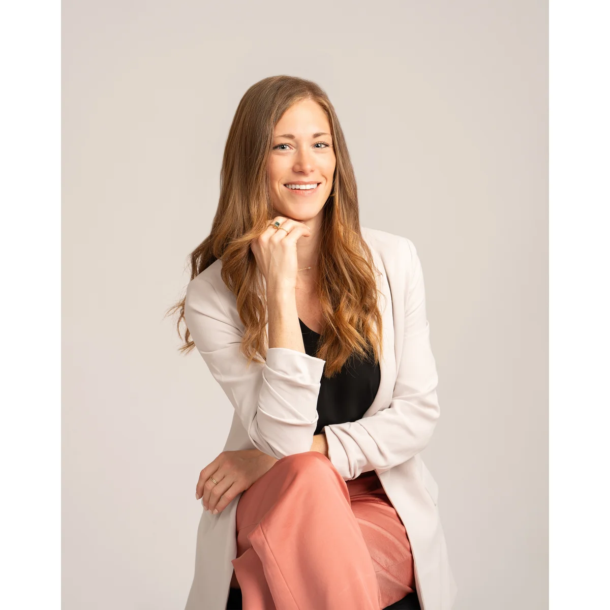 Female executive Tampa headshot with neutral studio backdrop by Captured by Mallary